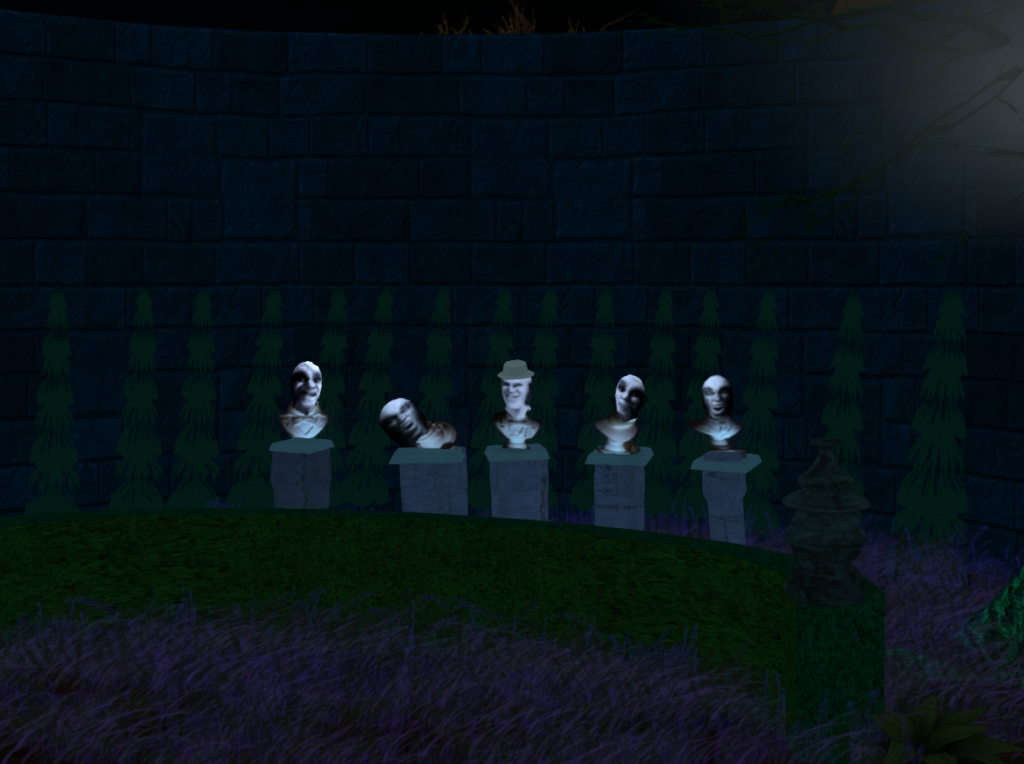 Haunted Mansion heads on tombstones